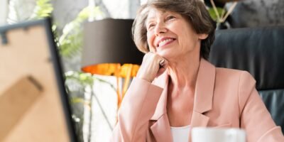 Inspired caucasian senior manager businesswoman dreaming about job promotion, pension